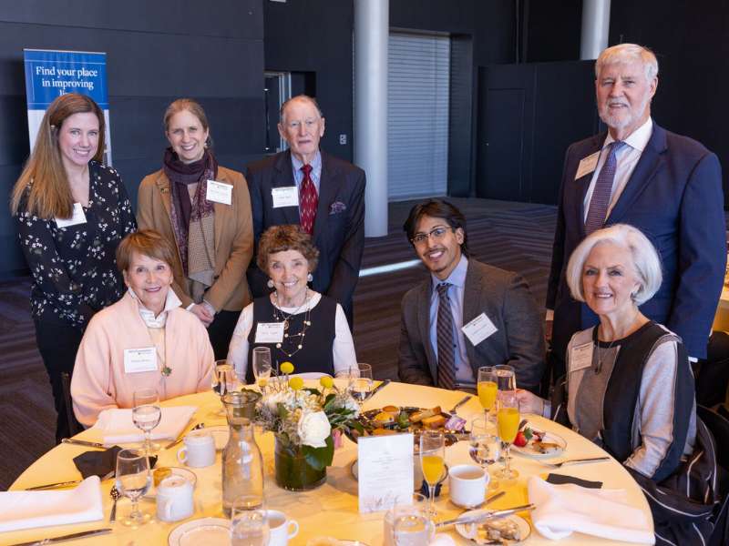 a group of school of nursing donors, students and the interim dean patricia kinser pose for a group photo