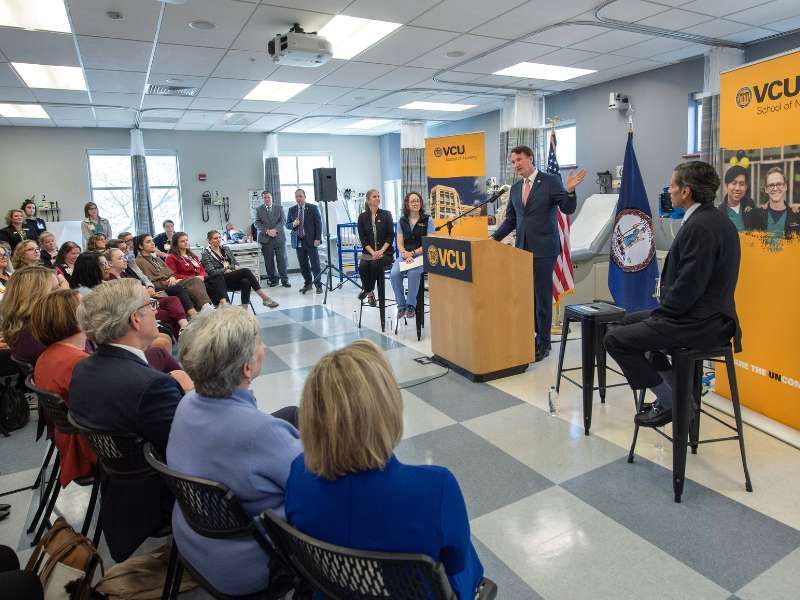 governor glen youngkin addresses an audience in the v.c.u. school of nursing clinical learning center