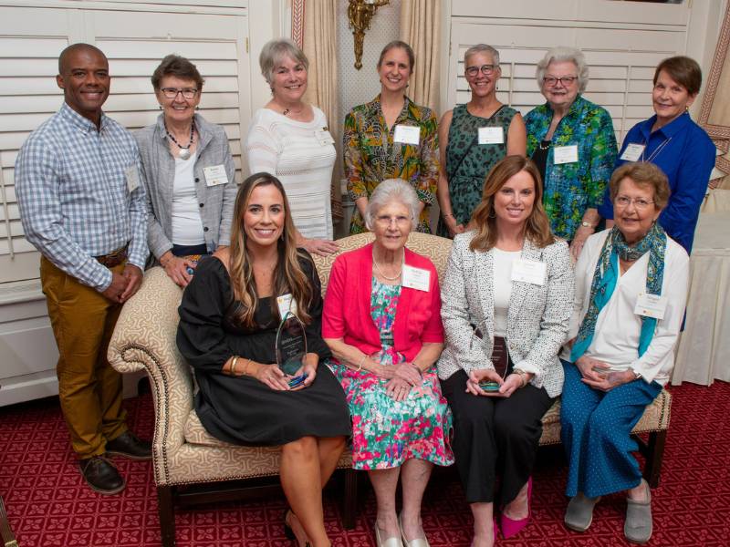 a group of v.c.u. nursing alumni pose at a reception