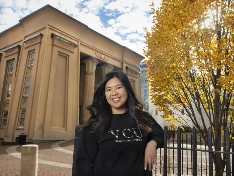 pia cruz poses in front of the egyptian building on the v.c.u. m.c.v. campus