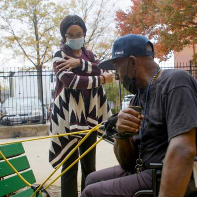 a richmond health and wellness student works with a clinic participant