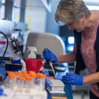 a nurse scientist working in a research lab