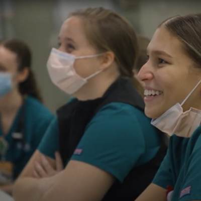 v.c.u. nursing students smile sitting in class