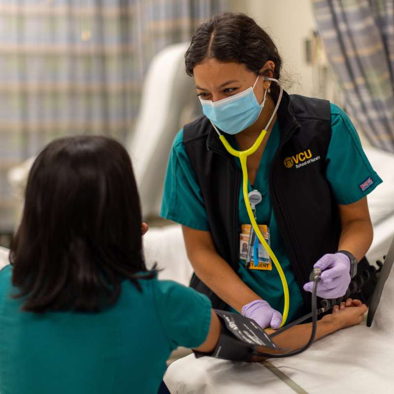 v.c.u. nursing students learning how to measure blood pressure