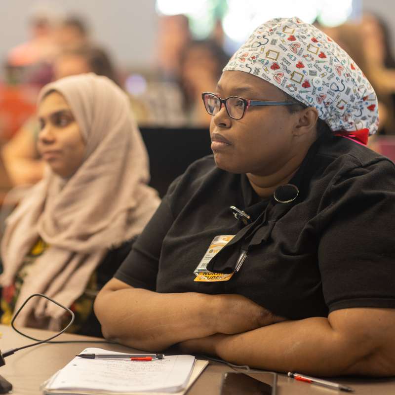v.c.u. students listening attentively in a classroom