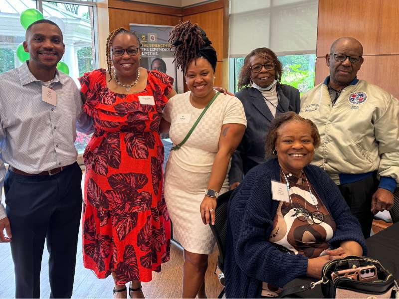 a group of v.c.u. nursing alumni smiling