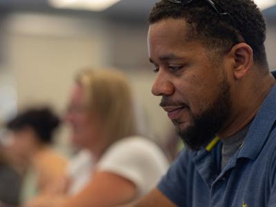 a v.c.u. student concentrating during a classroom lecture