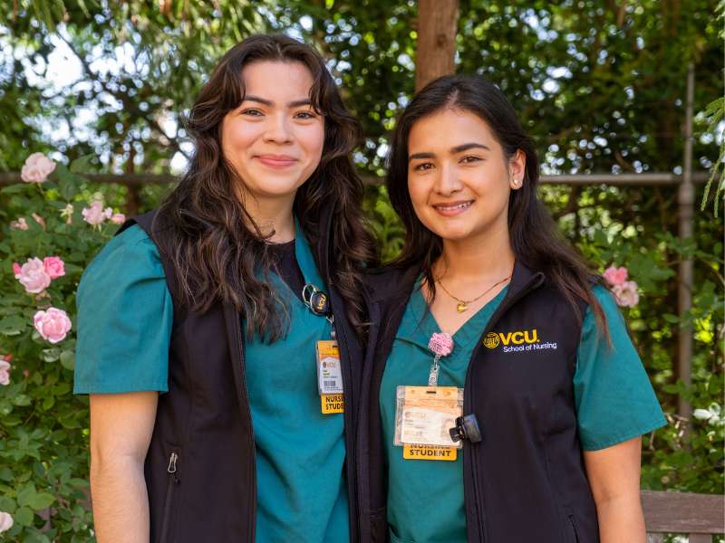 two v.c.u. nursing students in the school's garden