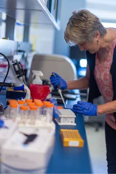 a nurse scientist works in a lab