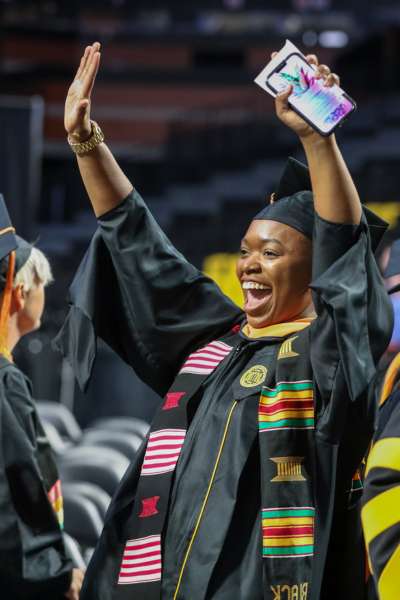 v.c.u. nursing student dressed in regalia in attendance at commencement